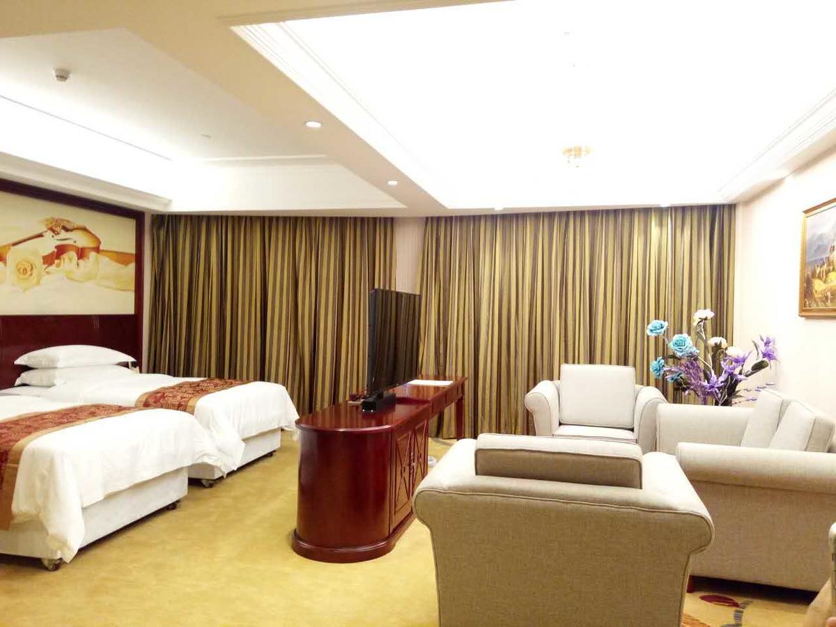 Vienna Hotel Zhongshan Guzhen Town Center エクステリア 写真